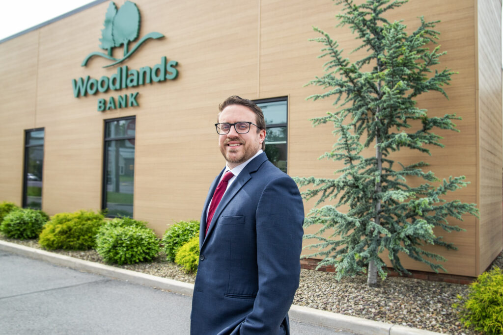 Portrait of Nathan Steinbacher, new commercial lender at Woodlands Bank